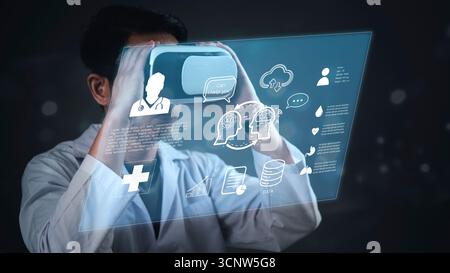 Medical professional explores future healthcare using VR headset, interacting with holographic interface displaying patient data, AI assistance, and i Stock Photo