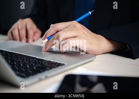 businessperson hands using technology computer laptop working online digital modern productivity learning and Browse internet data analysis management Stock Photo