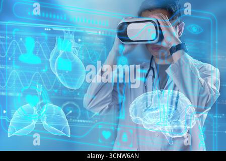 medical professional using a VR headset to explore holographic human anatomy, virtual reality and augmented reality in medical training and diagnostic Stock Photo