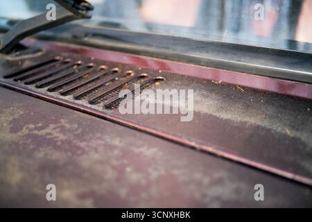 Close up of faded paintwork on a car bonnet Stock Photo