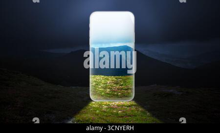 Surreal collage art. Smartphone glowing in dark valley projecting bright vision for digital branding Stock Photo