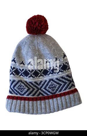 grey and blue patterned hat with maroon red pompom isolated on white background Stock Photo