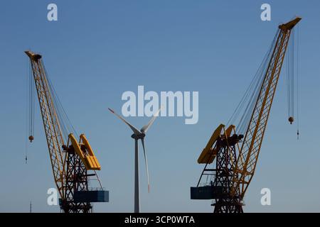 Shipyard cranes with sustainable wind energy, Viana do Castelo, Portugal. Stock Photo