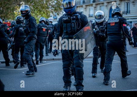 Angola Riot Police Police officer and a protester clash during the overnight clearance of ...