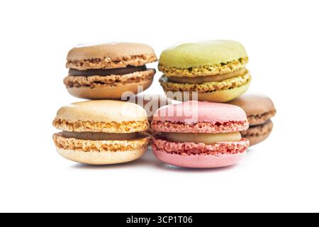 Different flavors of macarons. Colourful macaroons isolated on a white background. Stock Photo