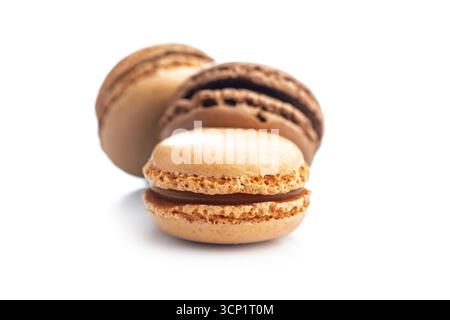 Different flavors of macarons. Colourful macaroons isolated on a white background. Stock Photo