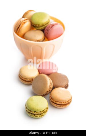 Different flavors of macarons. Colourful macaroons isolated on a white background. Stock Photo