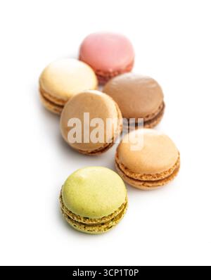 Different flavors of macarons. Colourful macaroons isolated on a white background. Stock Photo