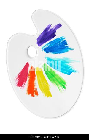 Rainbow color watercolor paints on artist's palette isolated over white Stock Photo