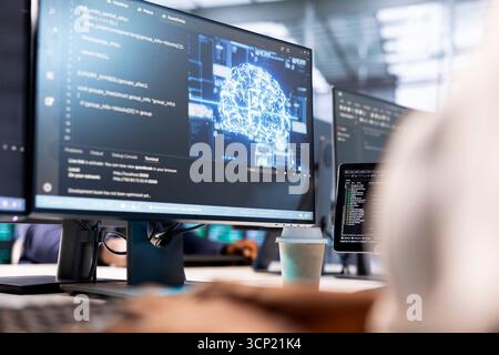Close up of admin in AI server farm checking recovery plan, monitoring energy consumption. Neural networks expert in data center making sure rigs are functioning optimally Stock Photo