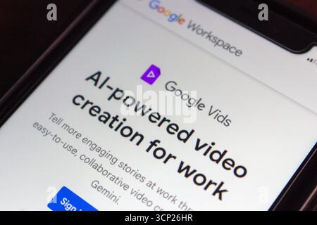 Google Vids interface on smartphone, highlighting AI-powered video creation feature for collaborative workplace use via Google Workspace. Stock Photo