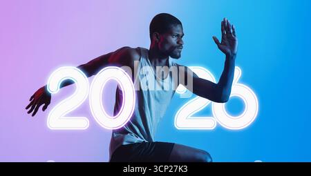 Young Black Athlete Running in Neon Lights During a Marathon Race Stock Photo