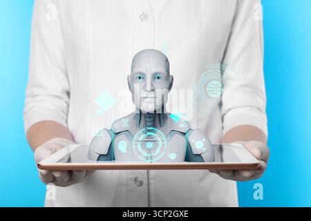 Artificial intelligence medical assistant. Healthcare worker holding tablet computer, closeup. Virtual screen with robot above device Stock Photo