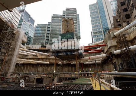 The 700-year-old tower of All Hallows Staining church is elevated on stilts during the 'Bottoming Out' ceremony of the new Fifty Fenchurch Street development in central London. Over 125,000 tonnes of earth has been removed underneath and around the medieval church tower to make way for the development of a new 650,000 sq ft 36-story office tower on the site, where the tower will form the center piece of a new public space. Picture date: Tuesday September 23, 2025. Stock Photo
