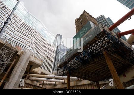 The 700-year-old tower of All Hallows Staining church is elevated on stilts during the 'Bottoming Out' ceremony of the new Fifty Fenchurch Street development in central London. Over 125,000 tonnes of earth has been removed underneath and around the medieval church tower to make way for the development of a new 650,000 sq ft 36-story office tower on the site, where the tower will form the center piece of a new public space. Picture date: Tuesday September 23, 2025. Stock Photo