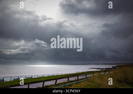 Stormy and Dark Skies Over Sea at Whitley Bay in Tyne and Wear Stock Photo