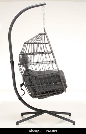Hanging sofa with bird's nest swing on the side isolated nature background with clipping path Stock Photo
