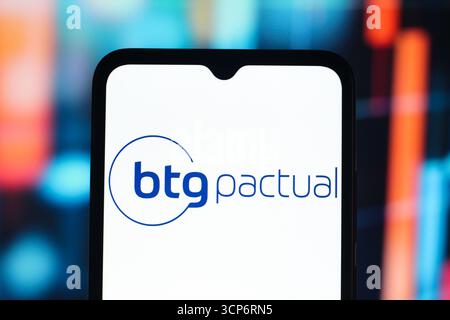 In this photo illustration, the logo of BTG Pactual is seen displayed ...