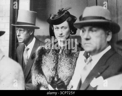 Duke And Duchess On Windsor Watch Grand Prix de Paris.Photo Shows:- The Duke and Duchess of Windsor at Longchamp. The Duke and Duchess Of Windsor were among the spectators at Longchamp when "Pharis", Owned by M. Marcel Boussac and ridden by C. Elliott, won the Grand Prix de Paris. Second was Baron E. De Rothschild's "Tricameron" and third was M. Robert Lazard's "Etalon Or", ridden by W. Johnstone. June 26, 1939. Stock Photo