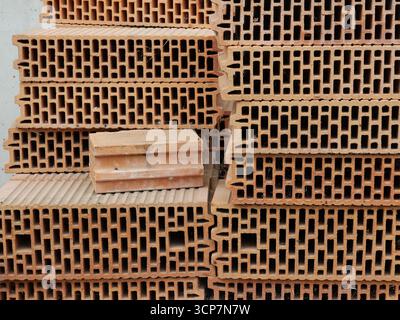 Stacked Poroton bricks showing visible hollow chambers. Close-up. Copyspace. Stock Photo