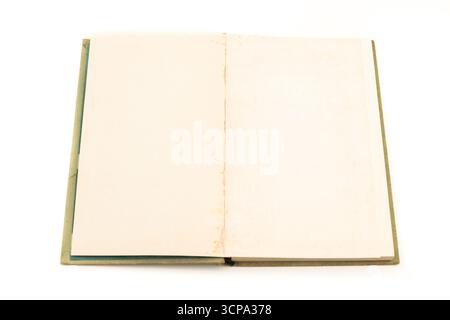 Open blank book on a simple white background showcasing potential stories and creativity Stock Photo