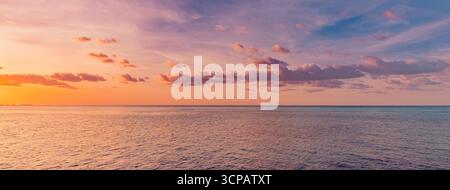Picturesque panoramic colorful sunset seascape dramatic sky, glowing clouds, golden sun rays, dream peaceful nature background, inspirational horizon Stock Photo