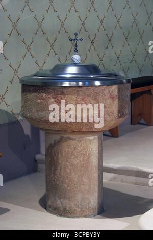 Baptismal font in Saint Peter church in Sveti Petar Orehovec, Croatia Stock Photo