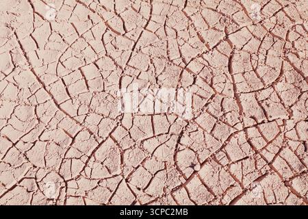 Dry cracked mud texture. Background of dried earth. Drought in Colombia. Stock Photo