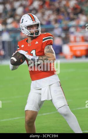 Miami, FL: Miami Hurricanes quarterback Carson Beck (11) passes the