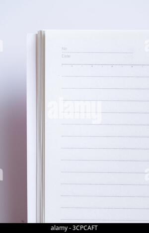 Close-up of blank notebook isolated on white background Stock Photo