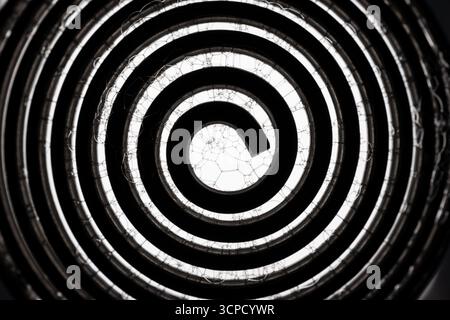 A metal spiral with soap bubbles abstract. Stock Photo