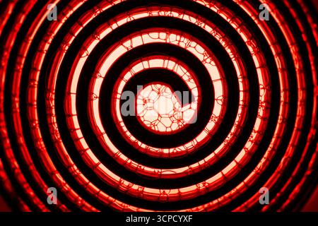 A metal spiral with soap bubbles abstract. Stock Photo