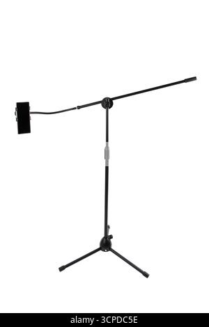 Black mic stand with boom arm holding a smartphone for video or content creation. Stock Photo