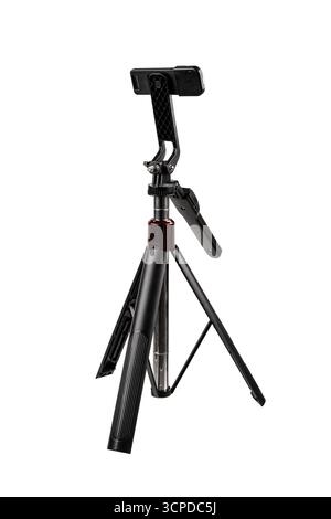 Compact tabletop tripod with a smartphone mount and an integrated LED light. Stock Photo