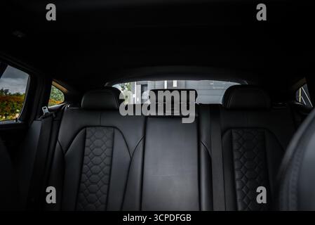 Interior Rear Seating of BMW X4 with Black Leather Upholstery Stock Photo