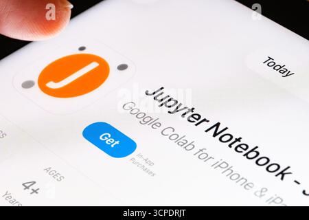 Jupyter Notebook on iPad with Apples new Liquid Glass updated app design iOS 26 Jupyter notebook tool listing in App Store. Stafford, United Kingdom, Stock Photo