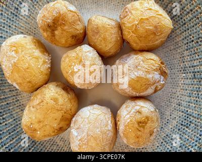 Traditional Canarian Potatoes Papas Arrugadas on a Plate close up. Stock Photo