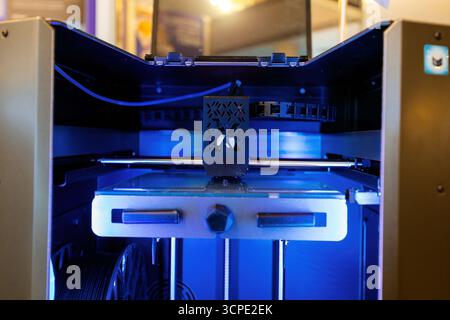 3D printing process of plastic machine part. Stock Photo