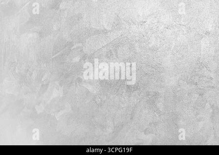 Silver pastel brushstrokes with oil paints on canvas will become the background for your products. Minimalistic and neutral composition, raw aesthetic Stock Photo