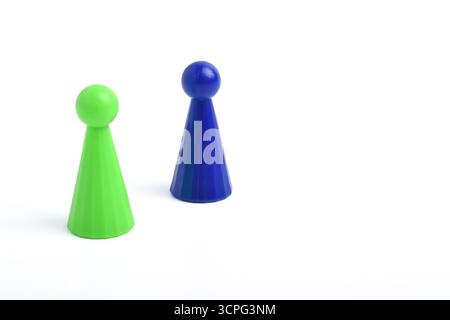 Green and blue board game pawn isolated on white background Stock Photo