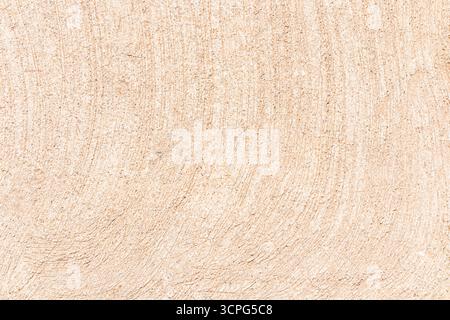 The texture of light sand natural building material. cement beige surface with textured stripes. sample. Stock Photo