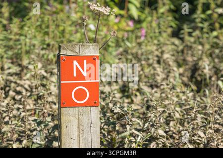 sign on a post with the word "NO" Stock Photo