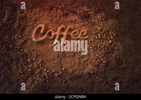 Word ''coffee'' spelled out in ground coffee Stock Photo