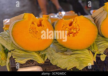 Big Pieces of Orange Flash Cut Pumpkins at Farmers Market in Turkey Fall Season Stock Photo