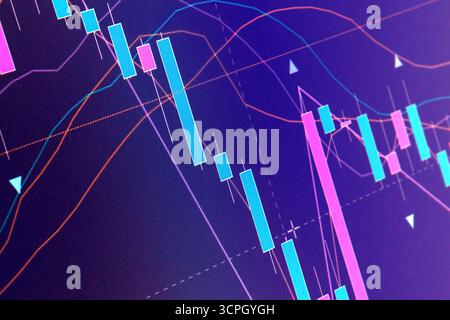 A close-up of a financial graph showing upward trends. Financial charts on LCD display. Background image with candlestick graphs. Selective focus. Stock Photo