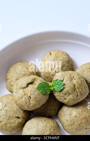 Close-up of homemade mint cookies on a white plate Stock Photo