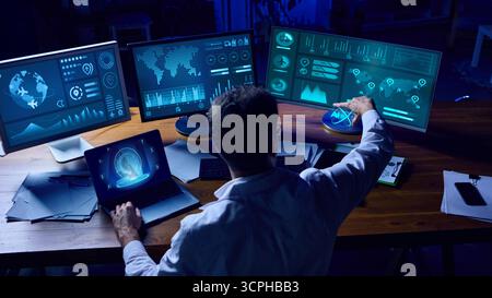 Analyst interacting with holographic AI system while managing big data on multiple screens. Collage Stock Photo