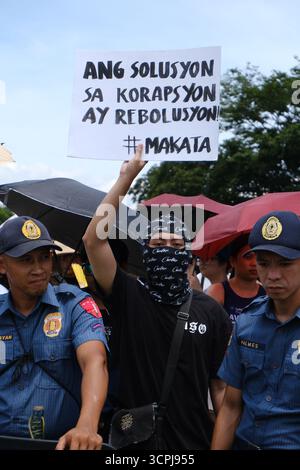 Filipino youth activists gather at Luneta Park in Manila during an anti ...