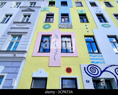 Colorful artistically decorated facade of an old residential house in Vienna, Austria Stock Photo