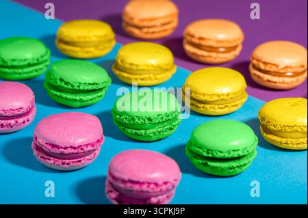 Colorful macarons  on a colorful background Stock Photo